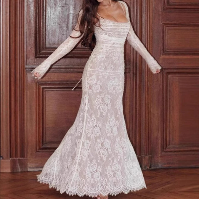 Elegant lace evening dress for women with deep V-neck and sheer sleeves Lune London