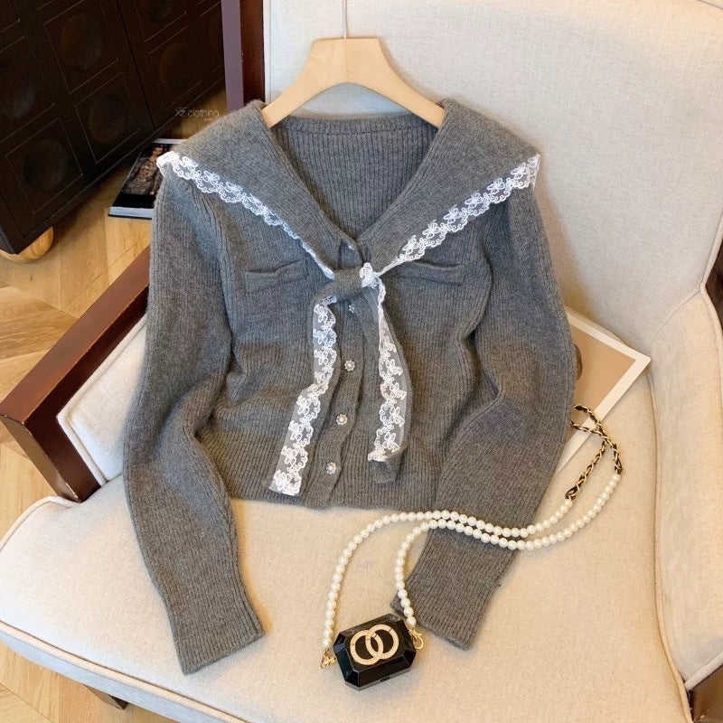 Knitted jacket for women with ruffled collar and decorative buttons Lune London