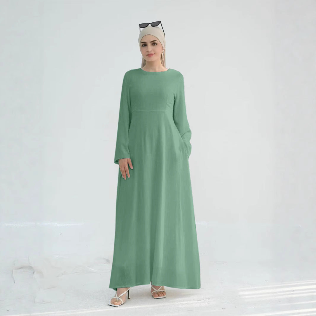 Elegant maxi dress for women with long sleeves and side pockets Lune London