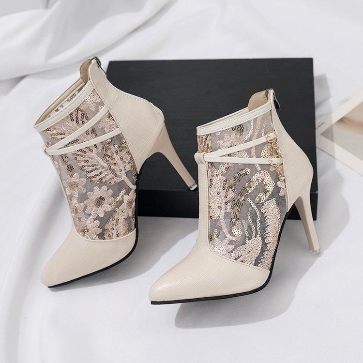 Elegant ankle boots for ladies with a transparent upper material and sparkling applications Lune London