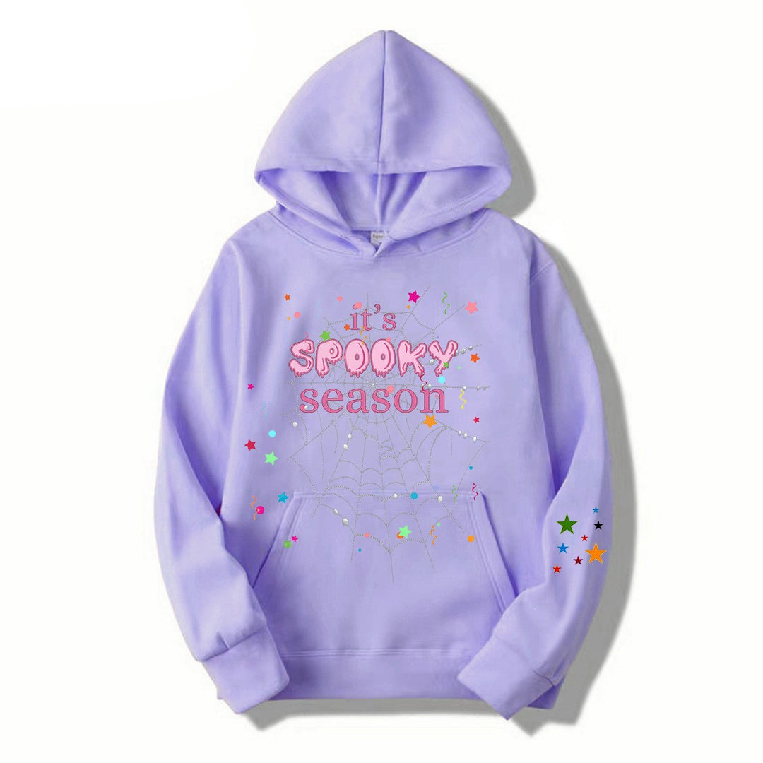Women cozy hoodie with graphic Halloween design Chic & Stil