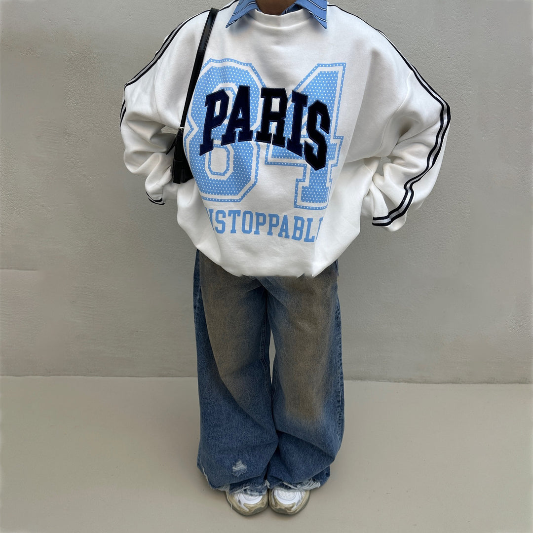 Oversized sweatshirt for women with Paris fashion print and striped accents Lune London