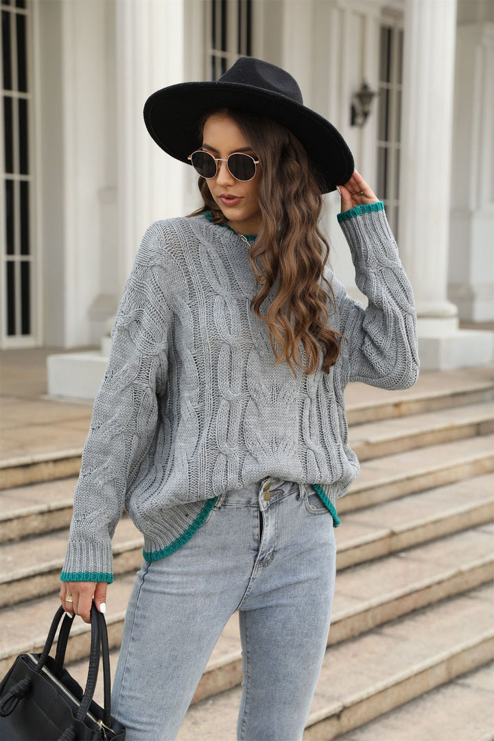Pull femme en tricot épais avec un motif en câble unique et des accents tendance Chic & Stil