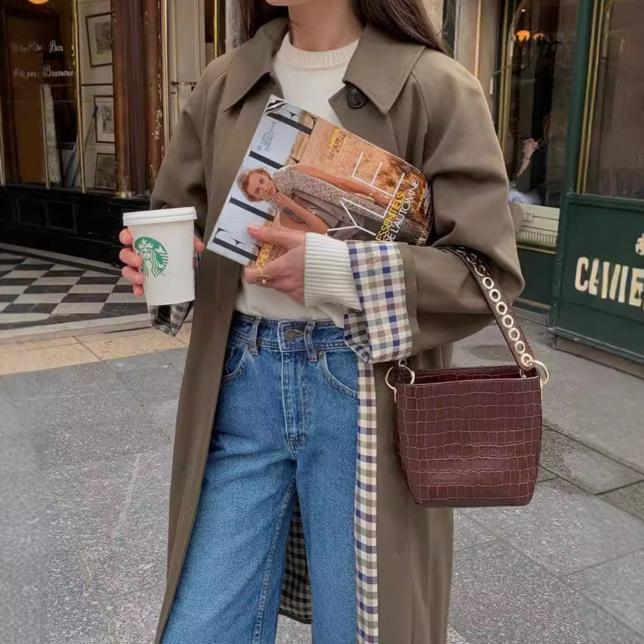 Fashionable trench coat for ladies with checked details and practical pockets Lune London