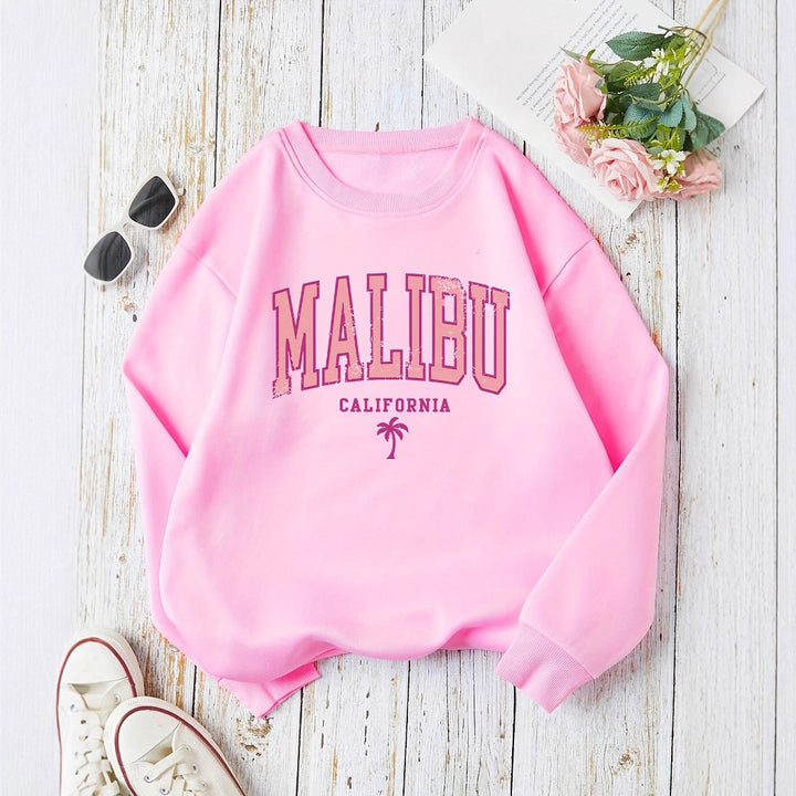 Sweat-shirt pour femme avec lettrage Malibu vif et coupe décontractée Chic & Stil