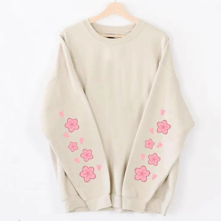Sweatshirt pour femmes avec design floral et manches amples Chic & Stil