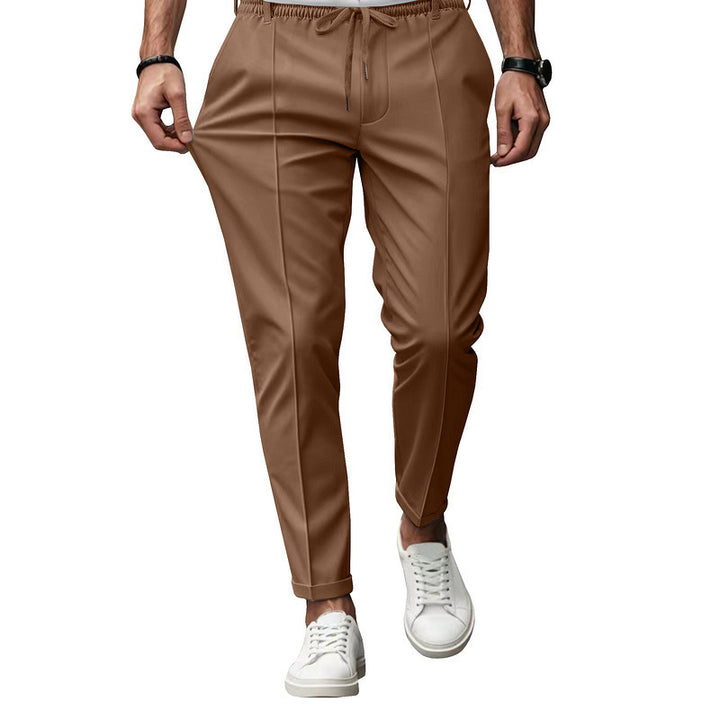 Men's fashionable sports pants with elastic waistband and practical welt pockets Lune London