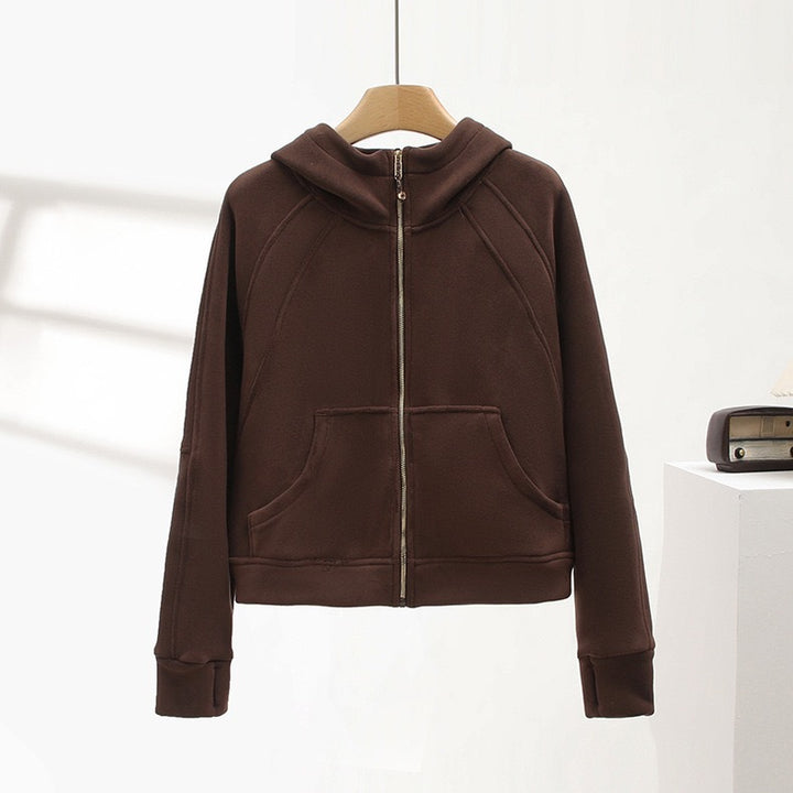 Veste à capuche confortable pour femme avec col montant et poches pratiques Chic & Stil