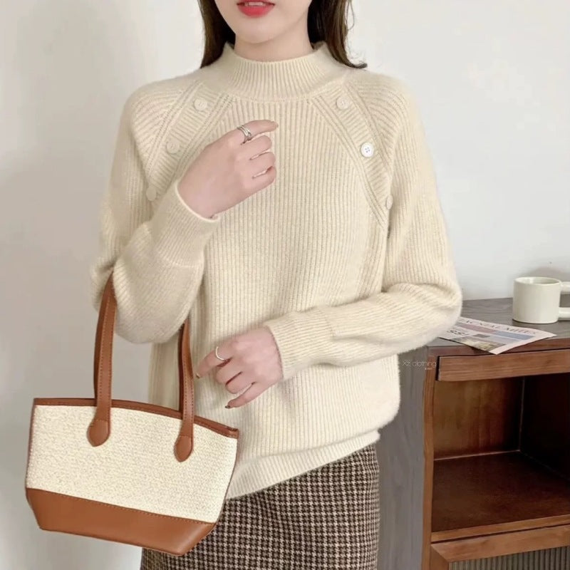 Chunky knit sweater for women with modern high collar and button details Lune London