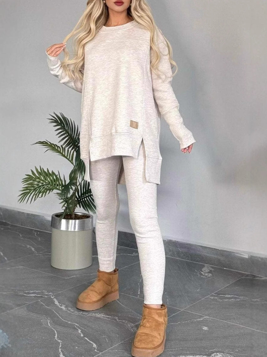 Ladies Casual Long Sleeve Asymmetrical Cut Sweatshirt with Practical Pockets Lune London