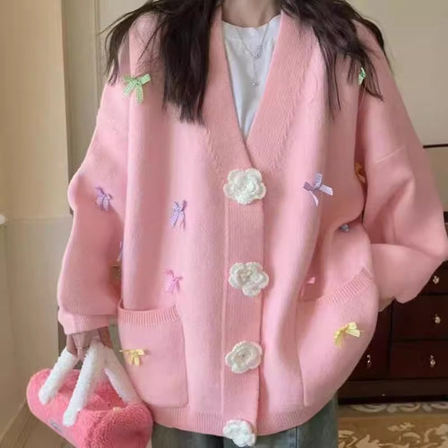 Ladies cardigan with playful flower appliqués and large buttons Lune London