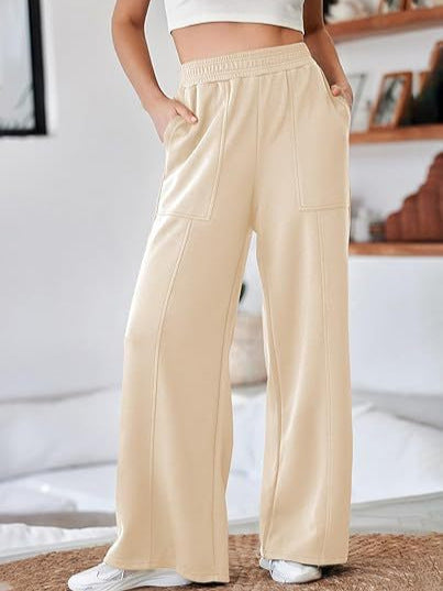 Loose sports pants for women with elastic waistband and practical side pockets Lune London