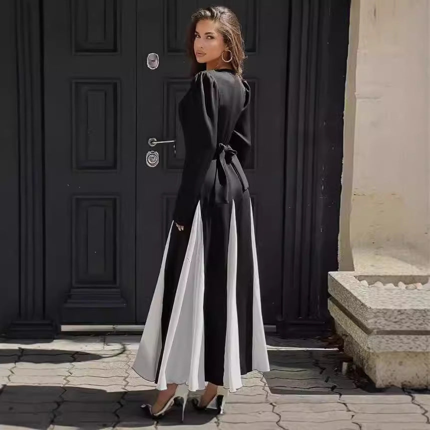 Elegant long dresses for women with puff sleeves and a flowing hem Lune London