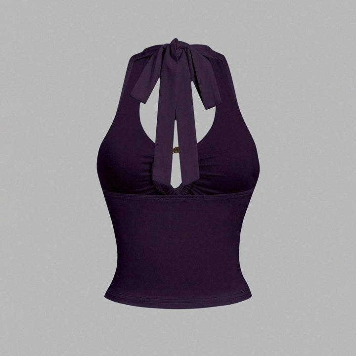 Stylish short top for women with a trendy halter design and a chic tie band Chic & Stil