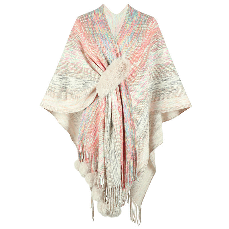 Ladies fashionable poncho with luxurious faux fur trim and creative fringes Lune London