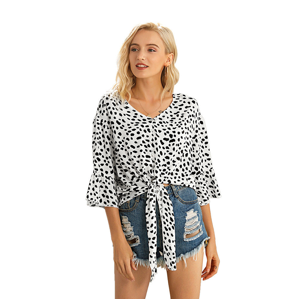 Casual women's wrap top with trendy polka dot pattern and fluid fabric Chic and Style