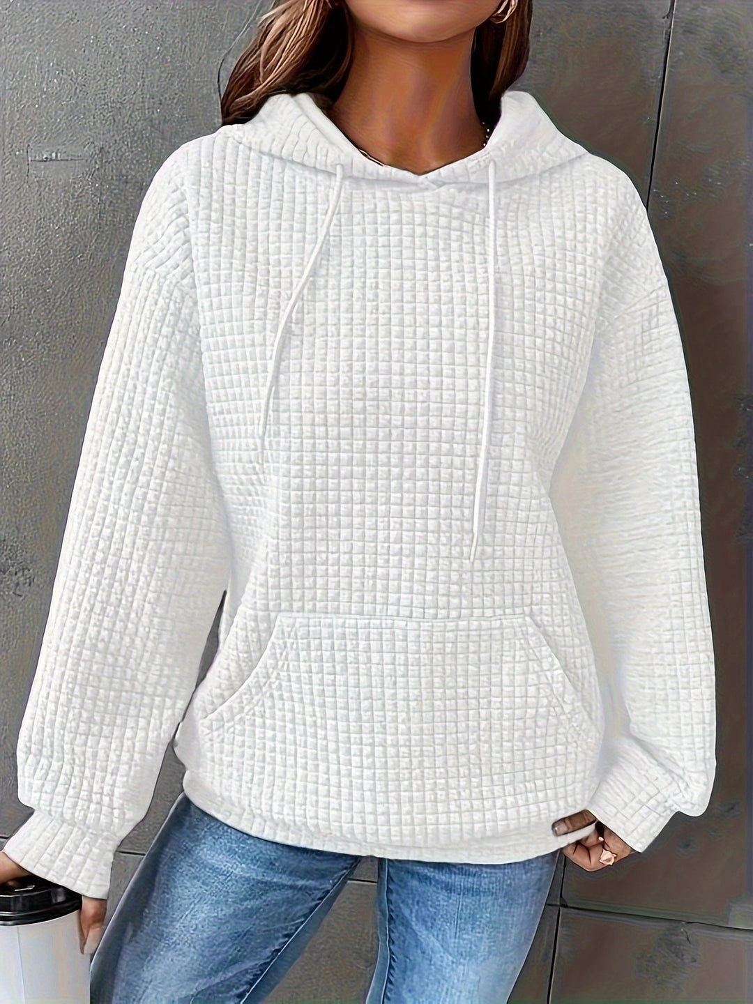 Sweat à capuche femme en motif waffle texturé avec poches latérales Chic & Stil