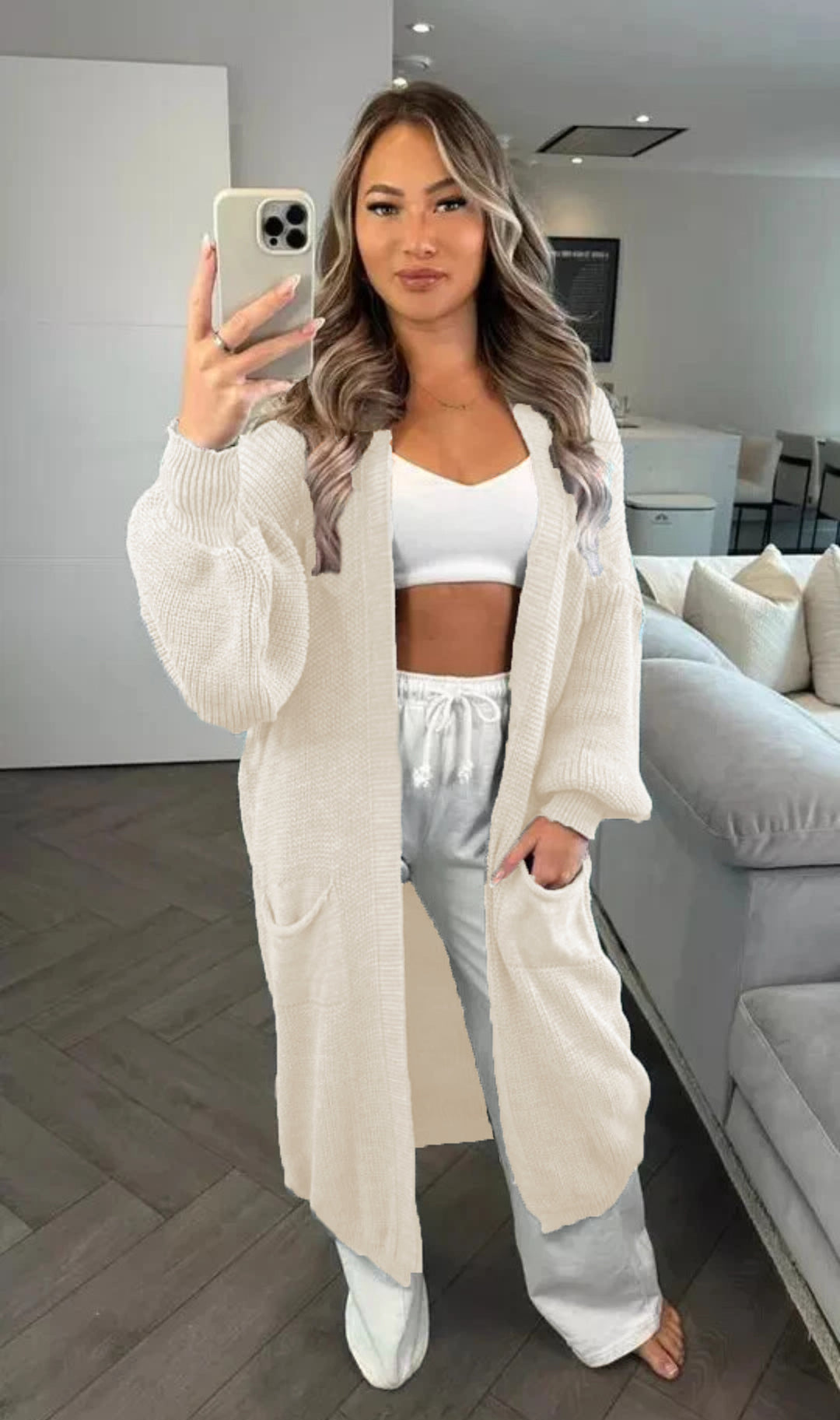 Chunky knit cardigan for women with a relaxed oversized style with practical pockets Lune Londonl