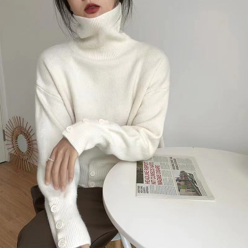 Pull femme à col roulé avec détails en boutons et matière douce Chic & Stil