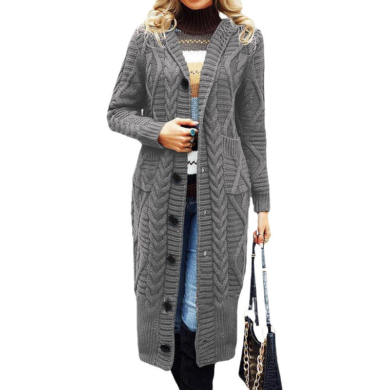 Chunky knit coat for women with practical pockets and elegant cable pattern Lune London