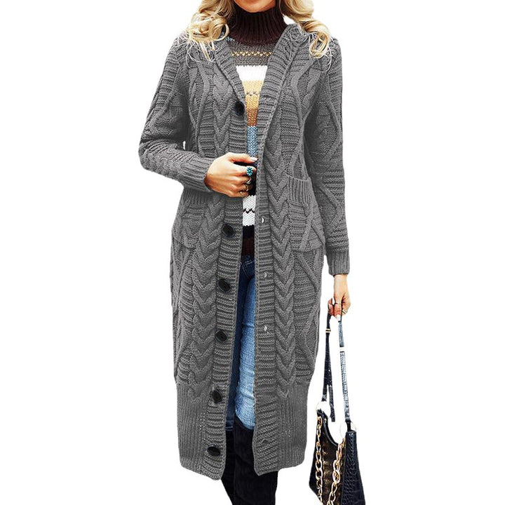 Chunky knit coat for women with practical pockets and elegant cable pattern Lune London