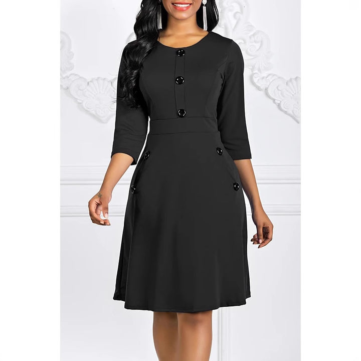 Classic three-quarter sleeve dress for women with buttoned details Lune London