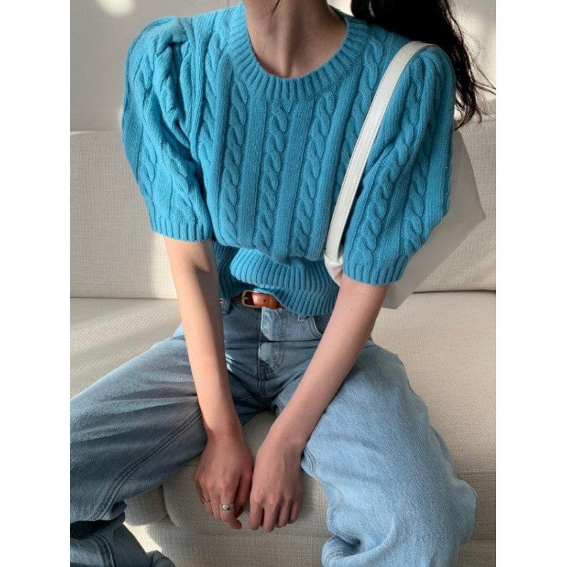 Knitted sweater for women with voluminous sleeves and cable knit pattern Lune London