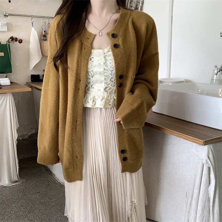 Ladies casual knitted cardigan with a fine texture and practical button details Lune London