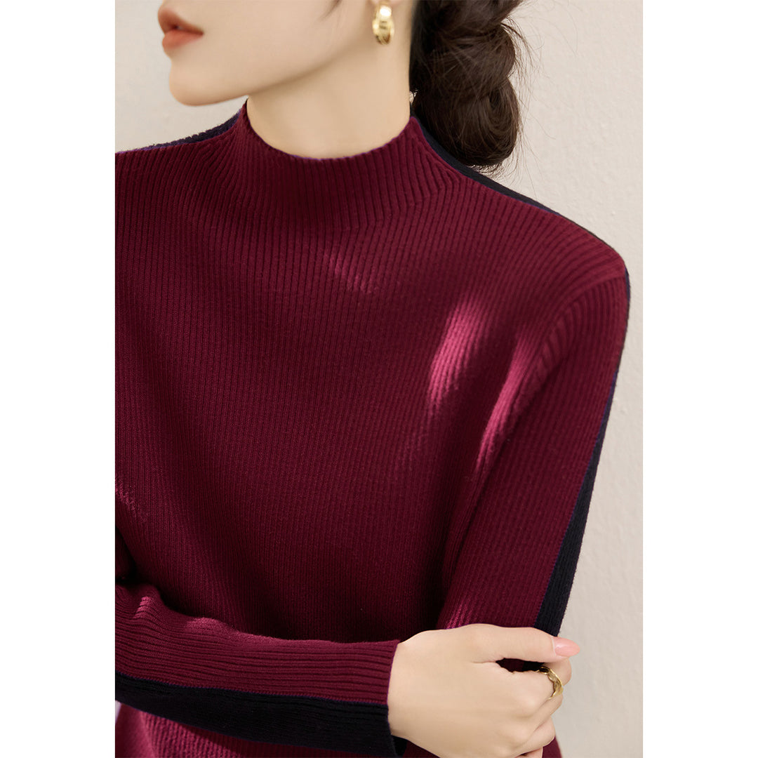 Pull à col roulé tendance pour femmes avec design en côtes texturées et manches contrastantes Chic & Stil