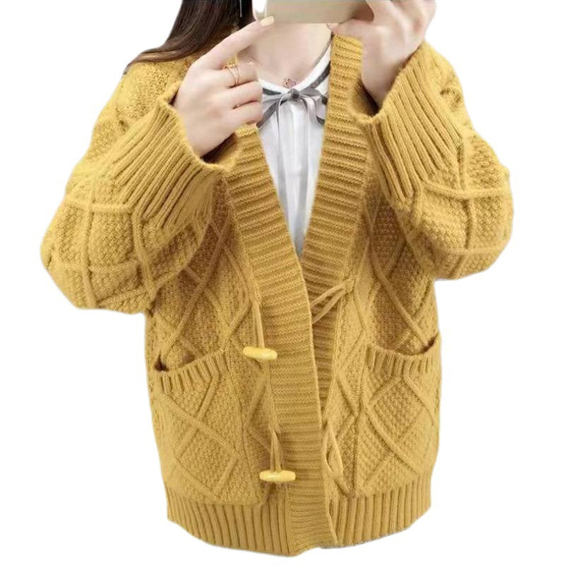 Knitted cardigan for women with a cable design and structures Lune London