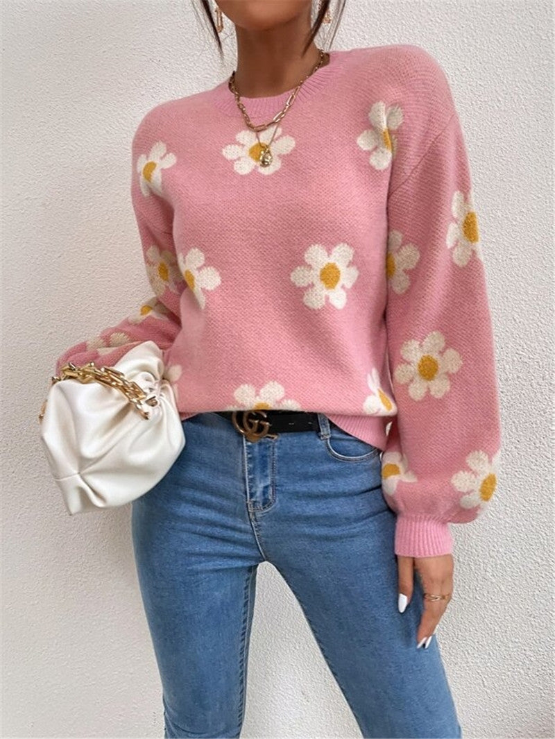 Knit sweater for women with a playful floral pattern and elegant puff sleeves Lune London