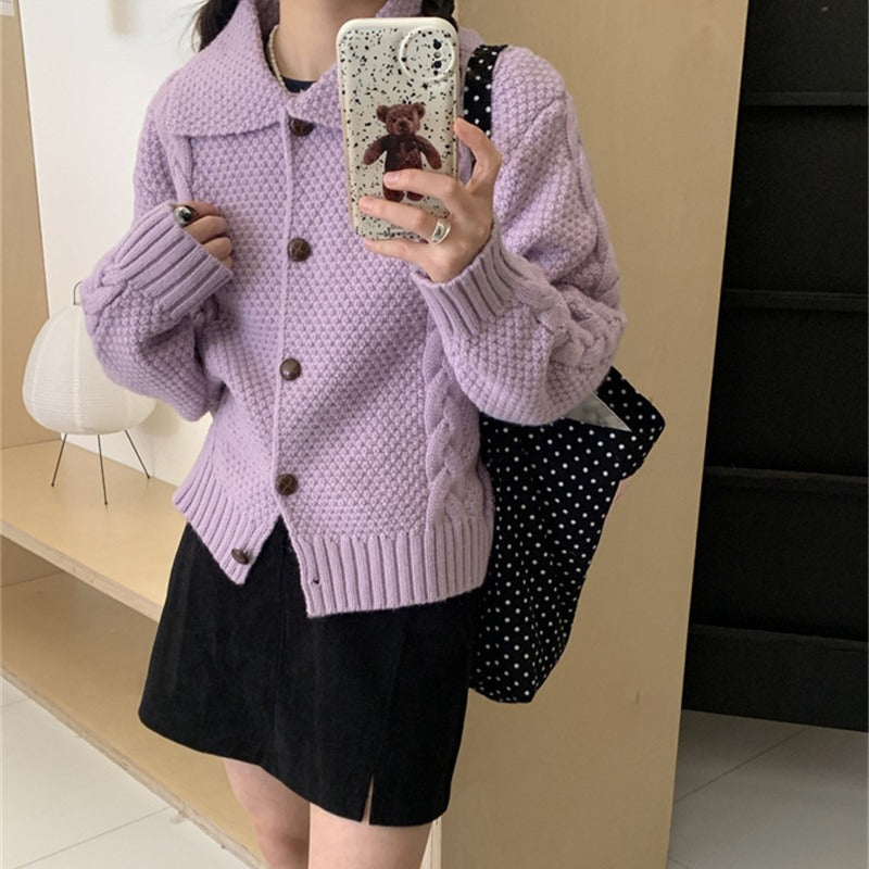 Women's oversized knitted jacket with cable design and chic texture and style