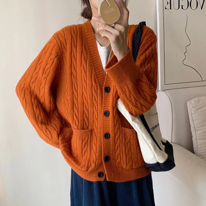 Ladies chunky knit vest with clover pattern and practical pockets Lune London