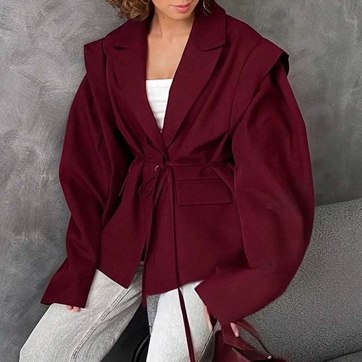 Blazer surdimensionné pour femmes avec ceinture à la taille et élégantes manches bouffantes Chic & Stil