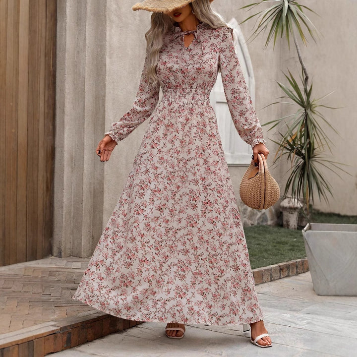 Maxi dress for women with a flattering cut and floral details Lune London