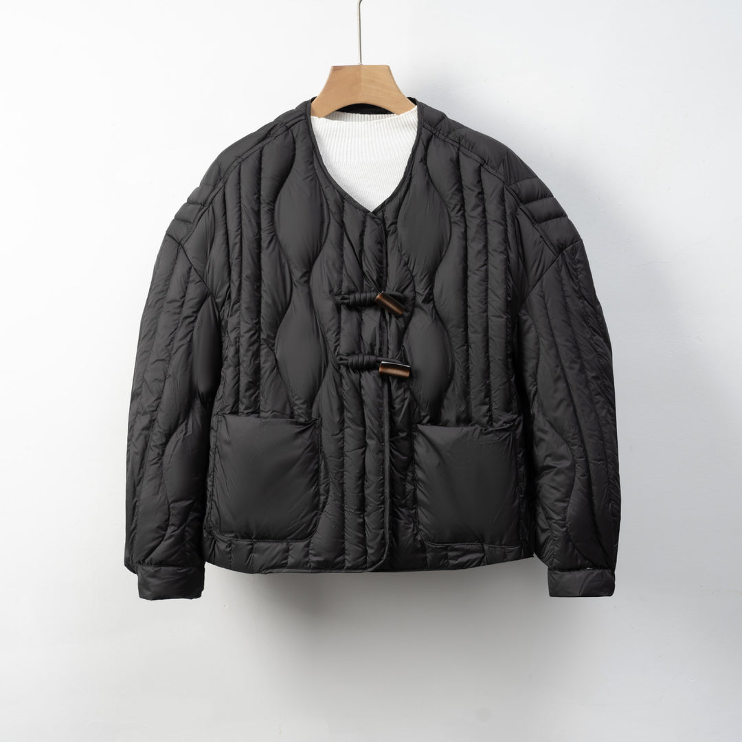 Quilted ladies' jacket with practical button closure and comfortable pockets Lune London