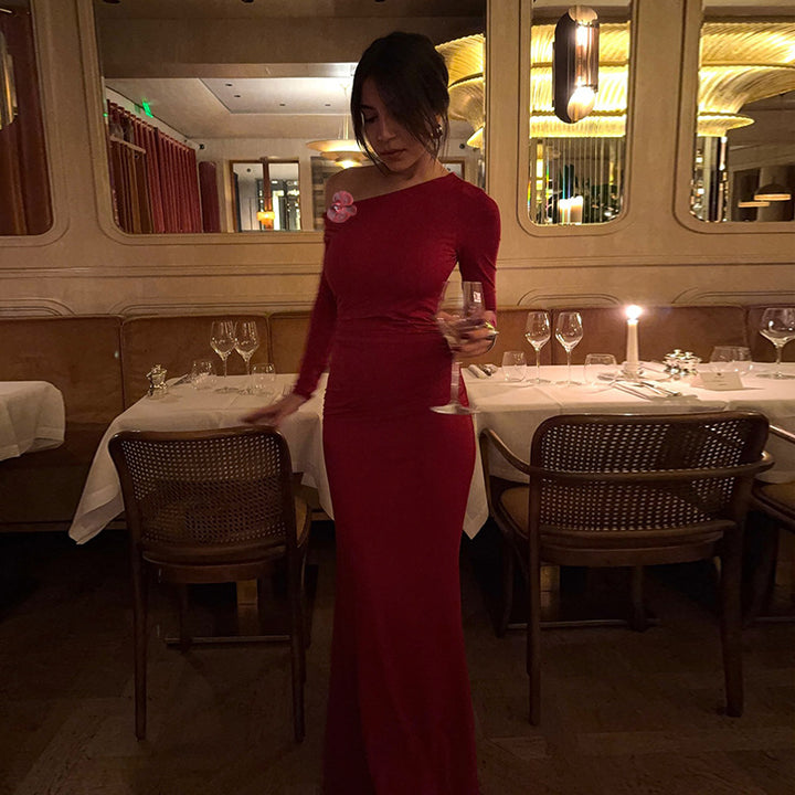 Ladies elegant long-sleeved evening dress with asymmetric neckline and figure-flattering design