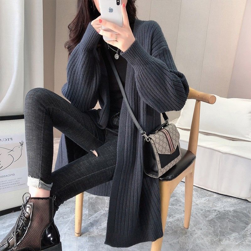Striped chunky knit cardigan for women with an open cut and long sleeves Lune London