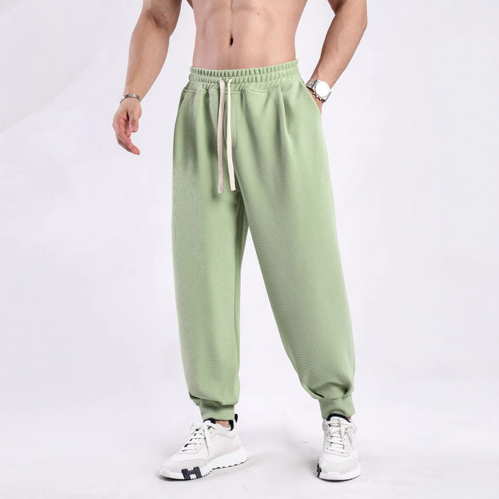 Casual men's jogging pants with elastic waistband and side pockets Lune London