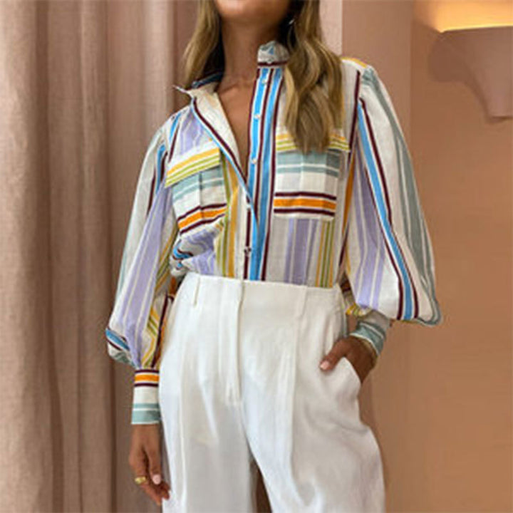 Blouse décontractée pour femmes avec des manches bouffantes élégantes et des motifs rayés Chic & Stil