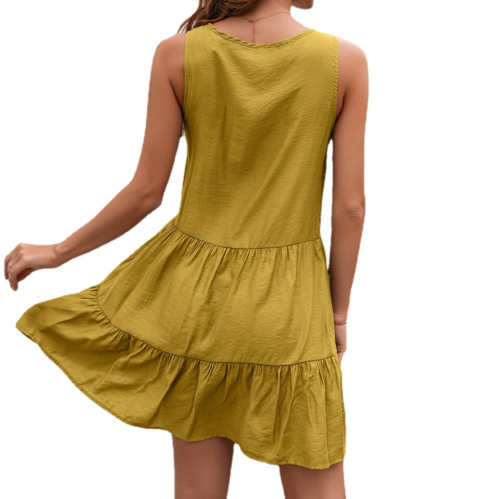 Sleeveless women's dress with crochet and pompom accents Lune London