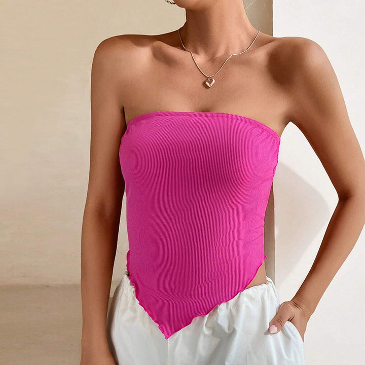 Chic & Stil Short women's bodysuit with off-shoulder design and asymmetrical hem