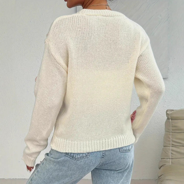 Ladies knit cardigan with hand-crocheted flower applications Lune London