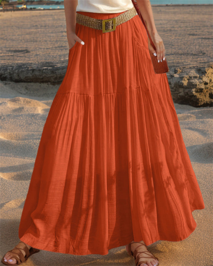 Maxi flared skirt for women with elegant pleated draping and practical pockets Lune London