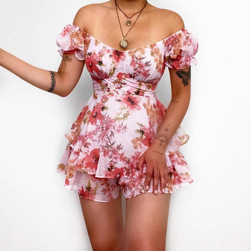 Women's short sleeve overall with romantic floral pattern and flowing cut