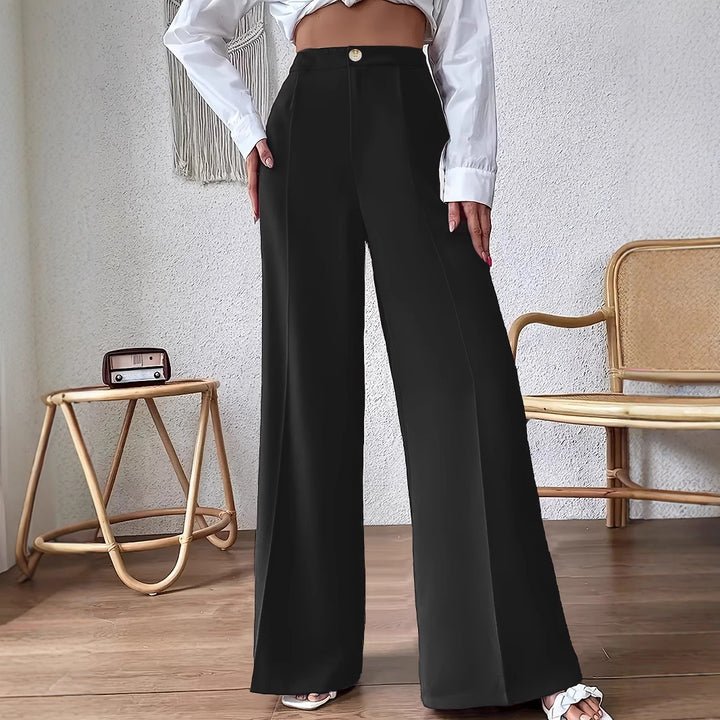 Wide palazzo pants for women with a stylish high waist cut and a button detail Lune London