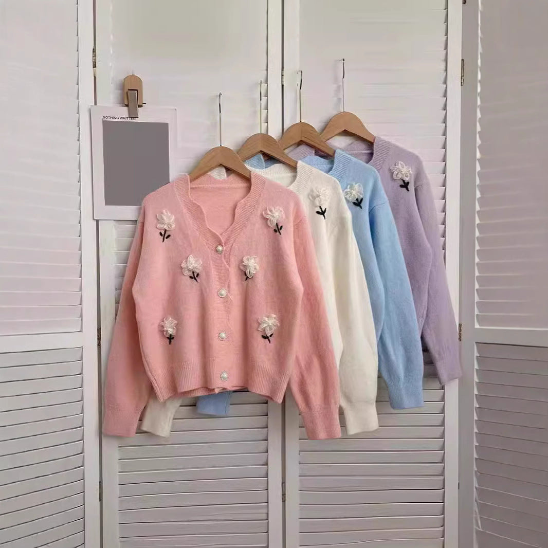 Sweater jacket for women with a floral design and elegant pearl buttons Lune London