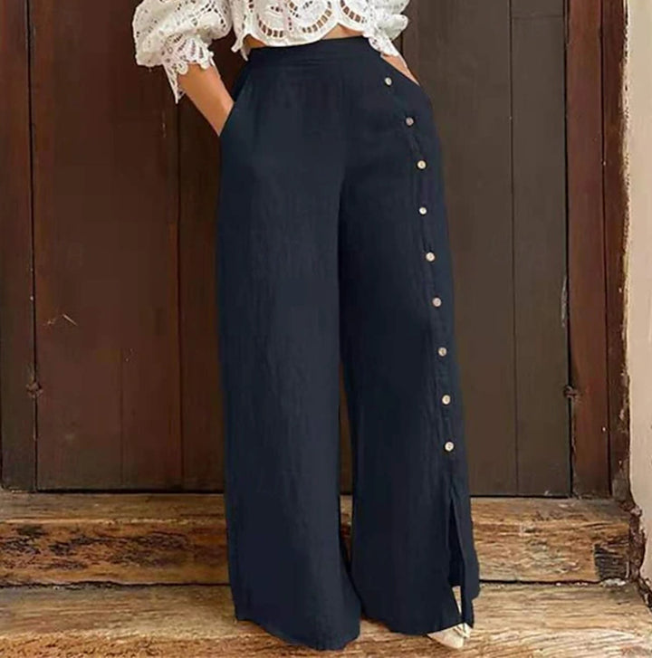 Pantalons larges en coton pour femmes avec détails de bouton sur le côté et ouverture de jambe élégante Chic & Stil