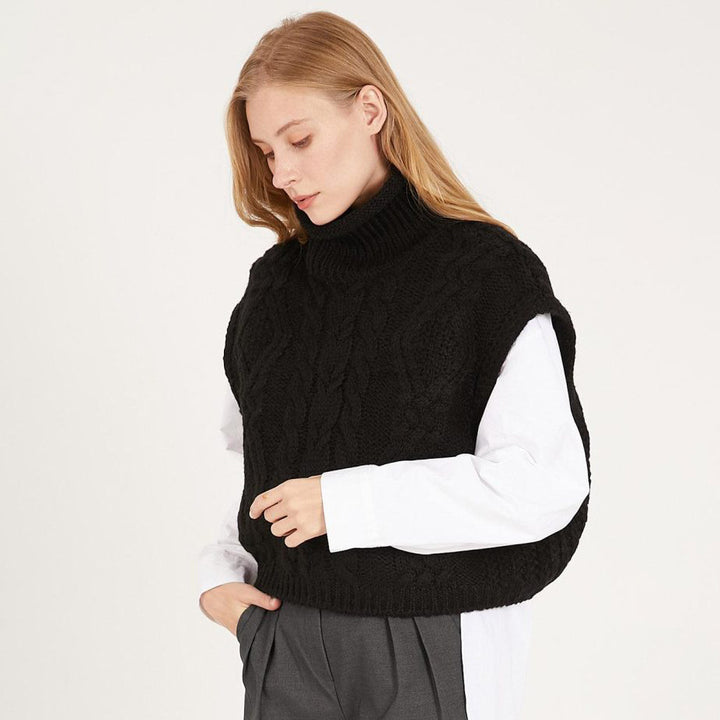 Trendy knitted sweater for women with high collar and cable knit pattern Lune London