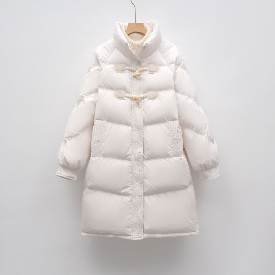 Elegant long coat for women with integrated buttons and a voluminous cut Lune London